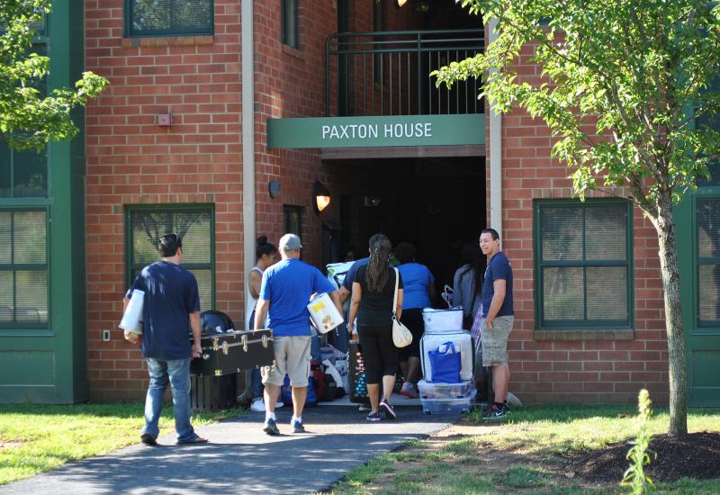 Paxton House exterior with students moving in