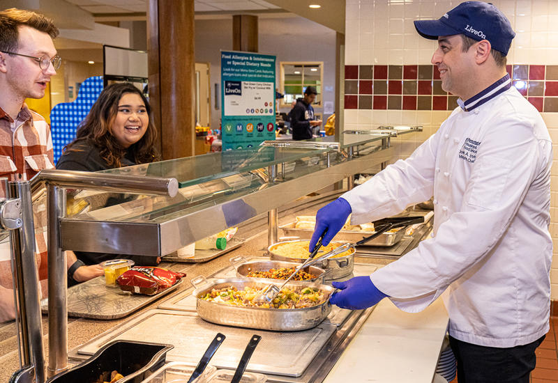 a chef serves students at Tullys at Berks campus