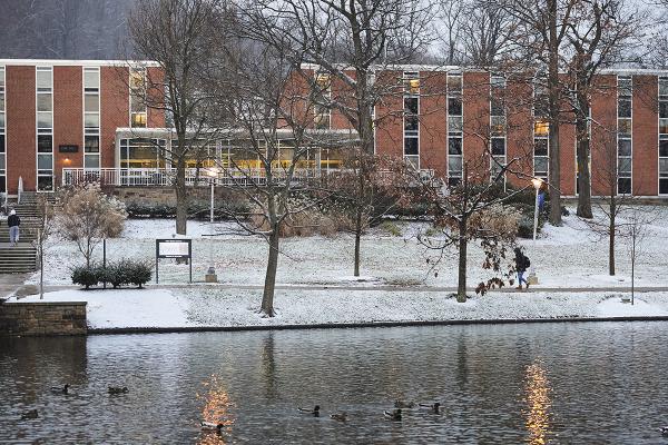 Oak Hall exterior in winter with view of duck pond