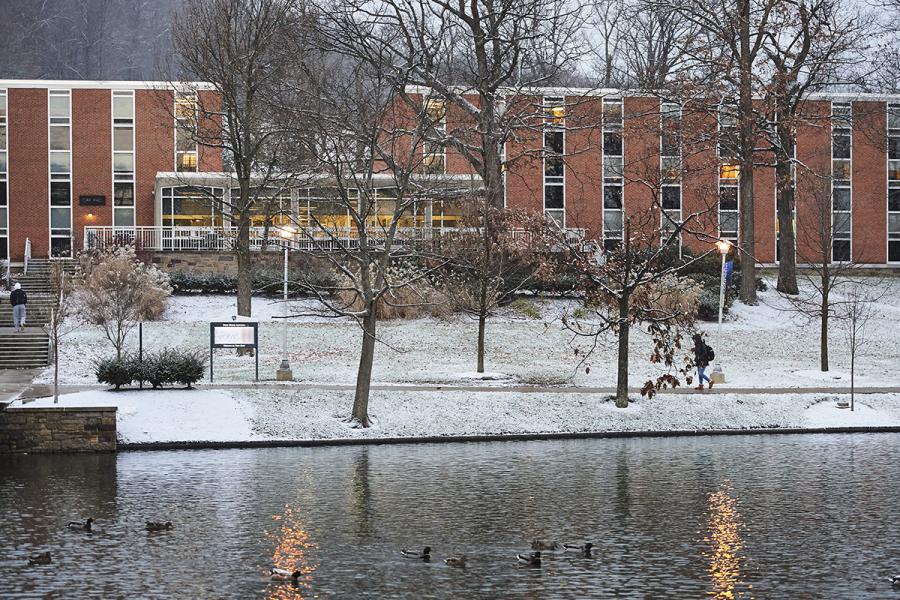 Oak Hall exterior in winter with view of duck pond