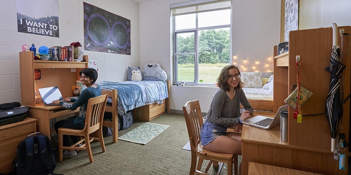 Juniata Residence Hall Room with Female Students sitting at desks