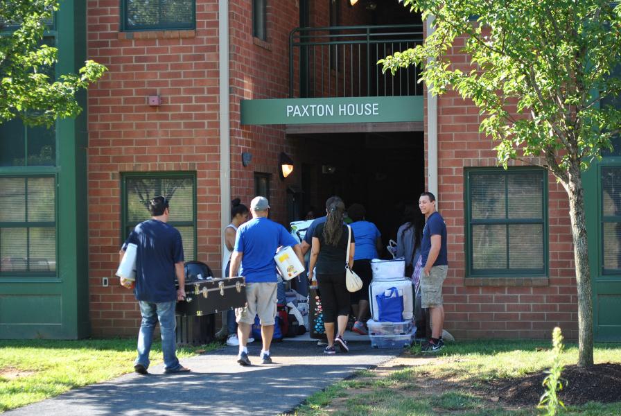 Paxton House exterior with students moving in