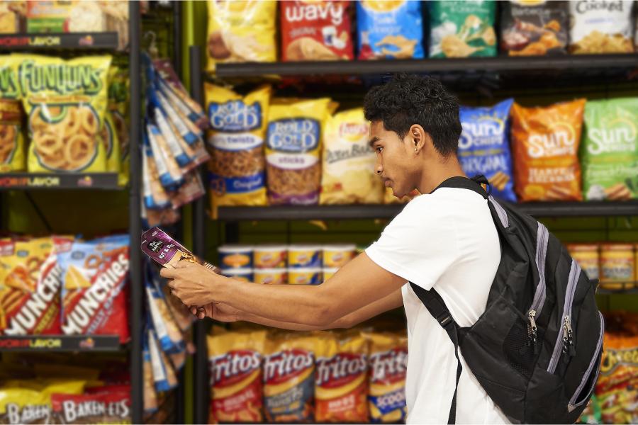student looking at the snacks available 