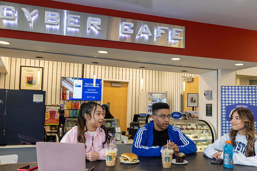 Students socializing at the Cyber Cafe at Berks campus