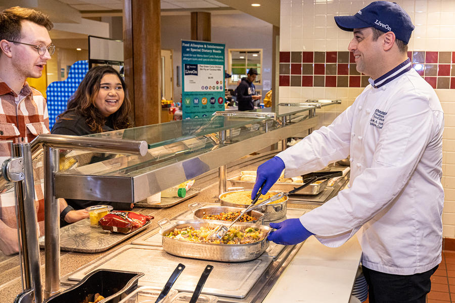 a chef serves students at Tullys at Berks campus
