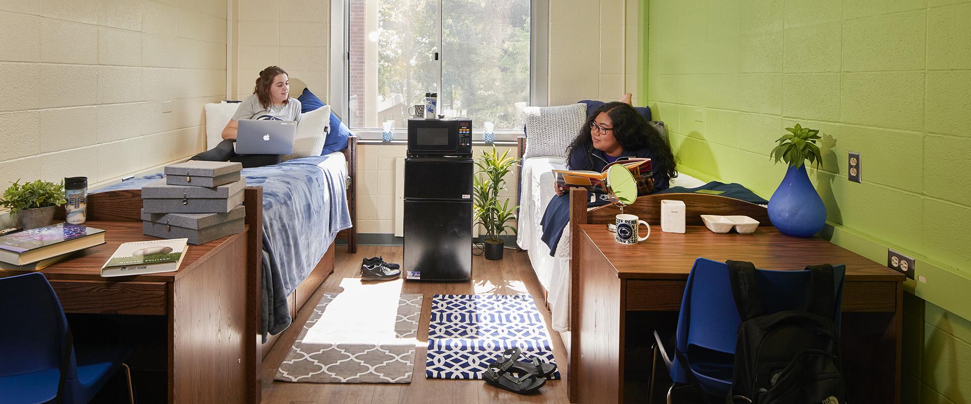 Two female students in a double room in McKeesport Hall