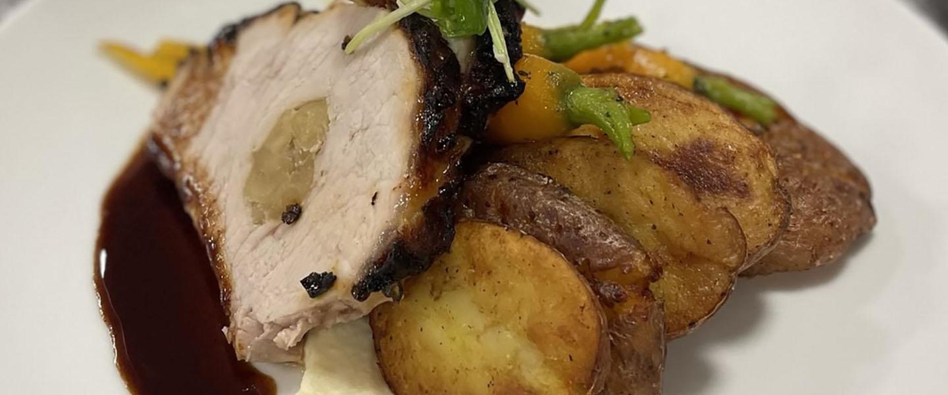 One of the dishes from Penn State's winning submission: bone-in stuffed pork chop with cranberry demi-glace, smashed fingerling potatoes, roasted carrots, and celery root puree. 